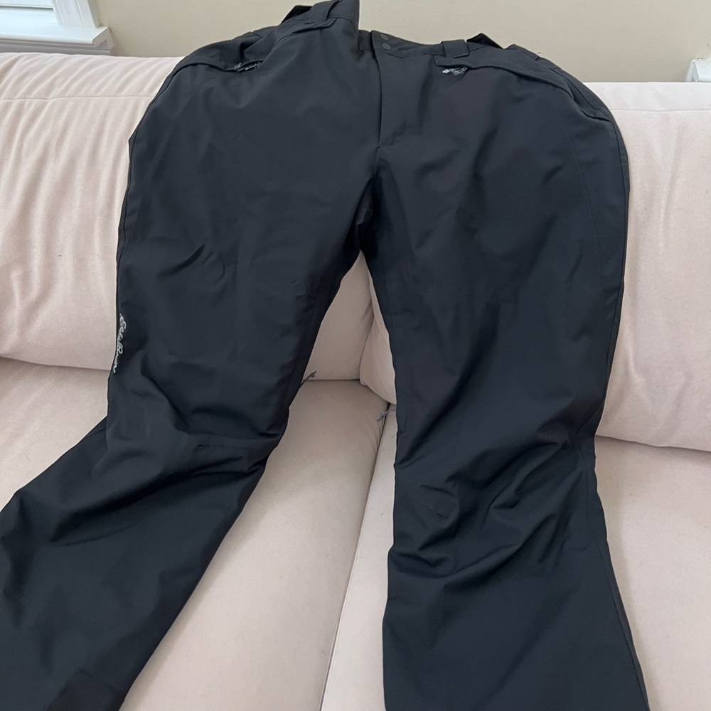 Snow pants brought and wore on a trip to Iceland ,they were too big so selling